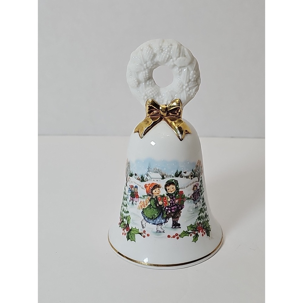 Avon 1986 Christmas Hand Bell Ornament Decoration Kids Ice Skating